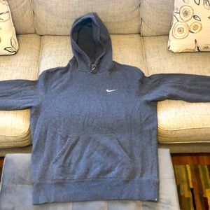 A grey Nike hoodie, size large.